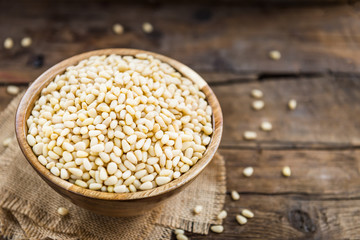 Shelled Raw Pine Nuts in the Wooden Bowl