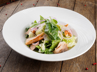 Salad with smoked Amur salmon