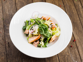 Salad with smoked Amur salmon