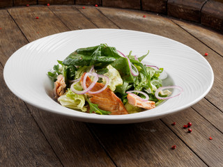 Salad with smoked Amur salmon