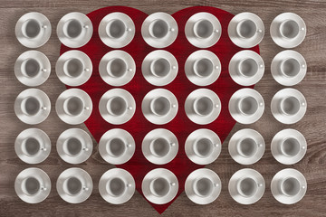 Romantic set of empty coffee cups on wooden background