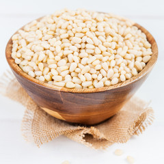 Shelled Raw Pine Nuts in the Wooden Bowl