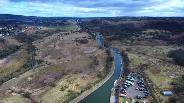 Aerial footage looking along the Forth and Clyde Canal from Kilsyth towards Falkirk.