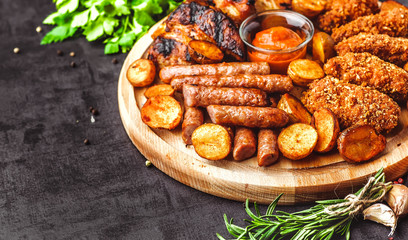 Variety of meat products including ham and sausages.