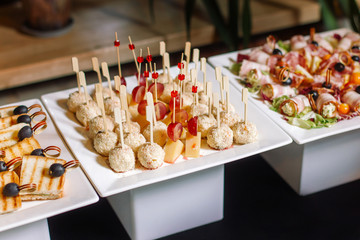 Cheese balls with sesame seeds.