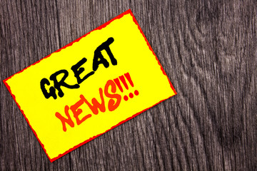 Conceptual hand writing text showing Great News. Concept meaning Success Newspaper Information Celebration written on Yellow Sticky Note Paper on the wooden background.