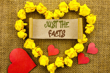 Handwriting Announcement text showing Just The Facts. Concept meaning Truth Fact Accuracy Honest Concept For Factual Actual  written on Sticky Note Paper With Heart on the textured background