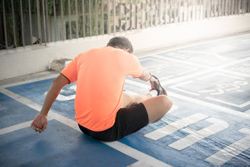 A manis warm up to preparing himselve for the run.