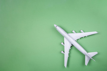 Fototapeta na wymiar Model plane,airplane on pastel color backgrounds.Flat lay design.