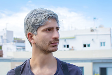 Portrait of gray haired caucasian man.