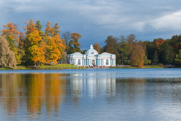 Fototapeta premium Grotto pavilion in autumn foliage in Catherine park, Tsarskoe Selo, Saint Petersburg, Russia