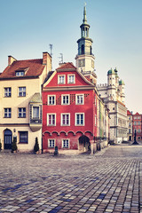 Obraz premium Market Square in the Poznan Old Town at sunrise, retro toned picture, Poland.