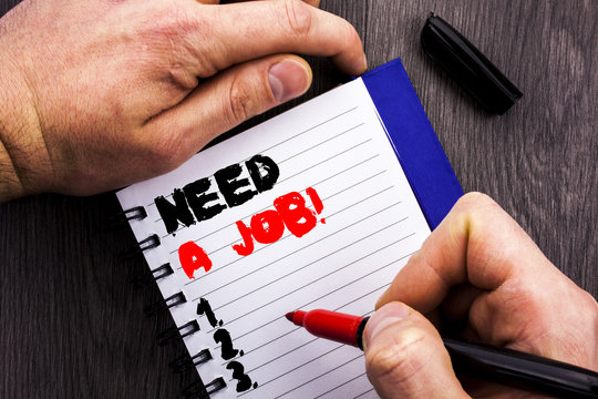 Handwritten text sign showing Need A Job. Conceptual photo Unemployment Jobless Worker Search For Career written on Notebook Book Man Writing Holding Pen wooden background.