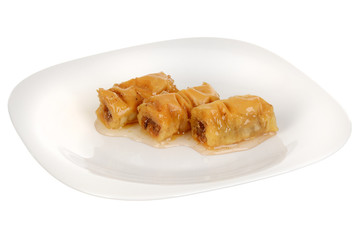 Three pieces of sweet dessert roll baklava