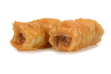 Two pieces of sweet dessert roll baklava