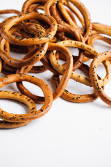 Pile of crispy cracknels isolated on white background