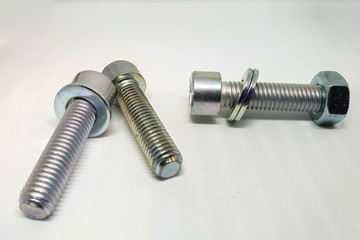 Group of bolt and nut on white background