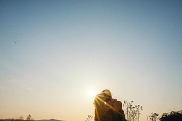 Young tourist couple at sunset sun
