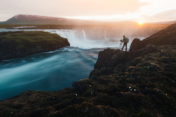 Fototapeta premium Colorful sunrise on Godafoss waterfall on Skjalfandafljot river, Iceland, Europe