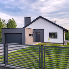 Villa with fence and garage
