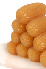 Traditional Turkish dessert tulumba on plate