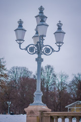 Fototapeta na wymiar Close up of public park lantern at the Royal Palace in Oslo