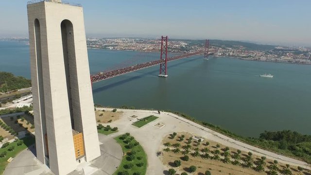 Aerial shot of the 25th of April bridge and Christ the King