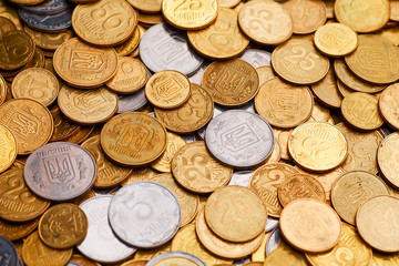 A large pile of coins from a Ukrainian bank. Ukrainian type coins: Kopeck. Concept for banking affairs, taxes, debt,