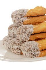 Sandwich cookies with coconut, oval shape filled with chocolate cream