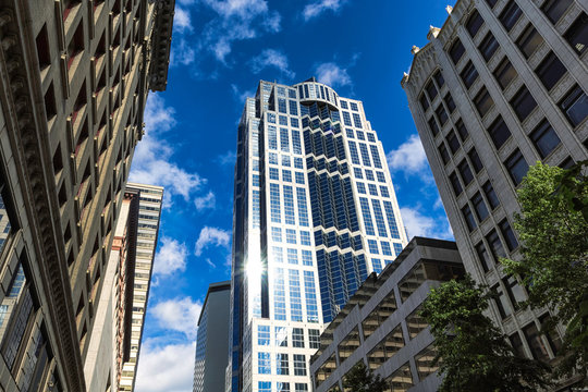 Seattle Downtown Buildings And A Sun Reflection In A Glass Skyscraper