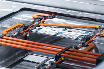 Electric car lithium battery pack and power connections. Blue toned.