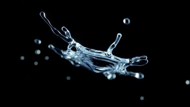 Cg animation of two water drops colliding splash black background. Slow motion with speed ramping. Has alpha matte.