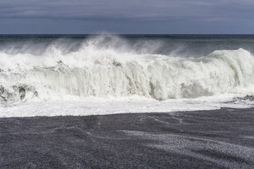 heavy waves with white wave crest