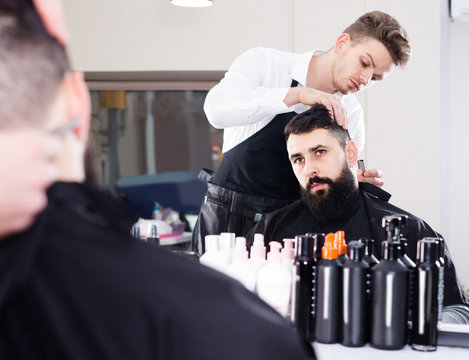 client feeling discontent about his new haircut at hair salon