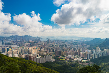 blue sky and crowded city