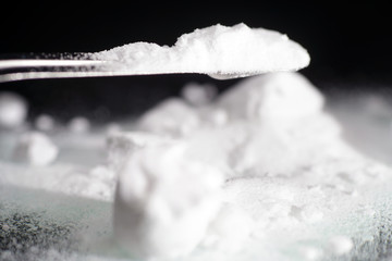 Sodium is a Chemical powder from the chemistry kit with macro lens photographed in studio
