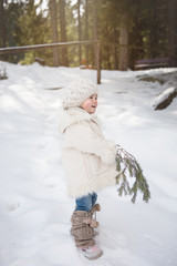 sweet toddler girl in snow 