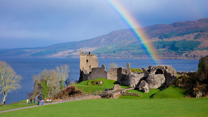 Rainbow in Urquhart Castle along Loch Ness lake in Scotland in a beautiful summer day, United Kingdom