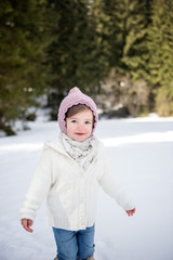 sweet toddler girl in snow 