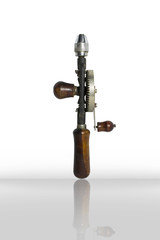 Hand drill tool isolated on white background. Old hand drill tool made of metal for punching with hand of mechanic.