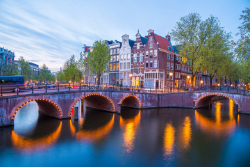 Obraz premium Famous Amstel river and night view of beautiful Amsterdam city. Netherlands