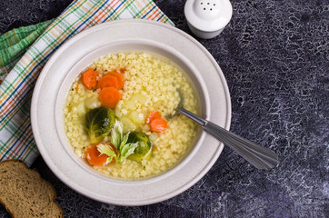 Thick clear soup with pasta