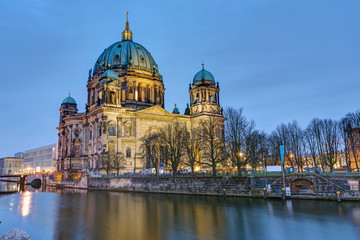 Fototapeta na wymiar The Cathedral of Berlin with the river Spree at dawn