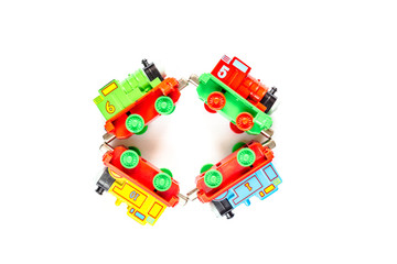 colored toy model of a train on a white background. isolated