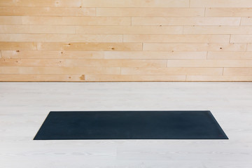 Gym with yoga mat on the floor