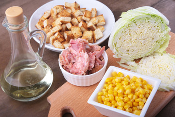 Fresh Chinese cabbage, Sweet canned corn, Delicious crispy croutons and canned tuna. Ingredients for dietary salad.