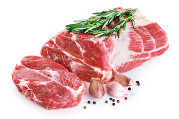 Fresh raw pork neck meat, garlic, pepper and rosemary isolated on white background.