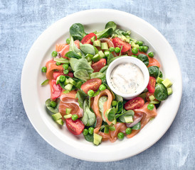 Vegetable salad with salmon