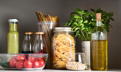 Kitchen pantry with italian food products.
