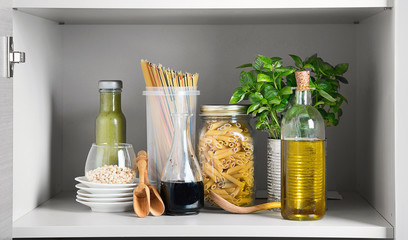 Kitchen pantry with italian food products.